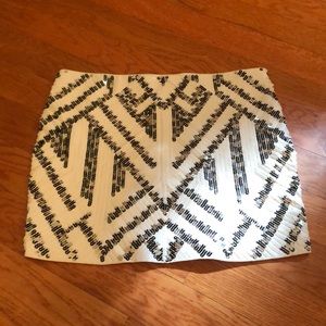 White & silver Express miniskirt. Only worn once!